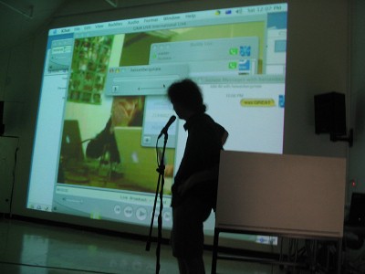 A man speaking into a microphone.