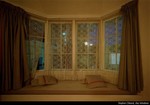A seat in a bay window.