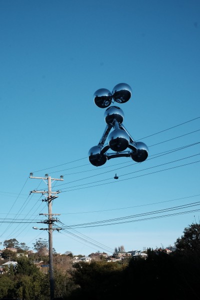 A balloon and power lines.