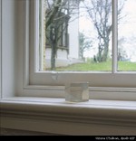 An object on a window sill.