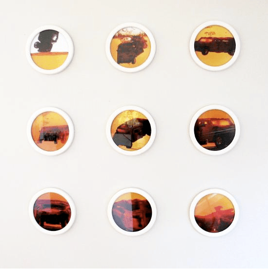Nine circles in a white frame with pictures of cars.